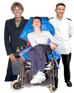 Health profesionals and a boy in a wheelchair